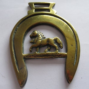 Antique Horse Brass Cantering Trotting Passant Horse Brass In A Horseshoe Martingale Medallion With Getts On Reverse