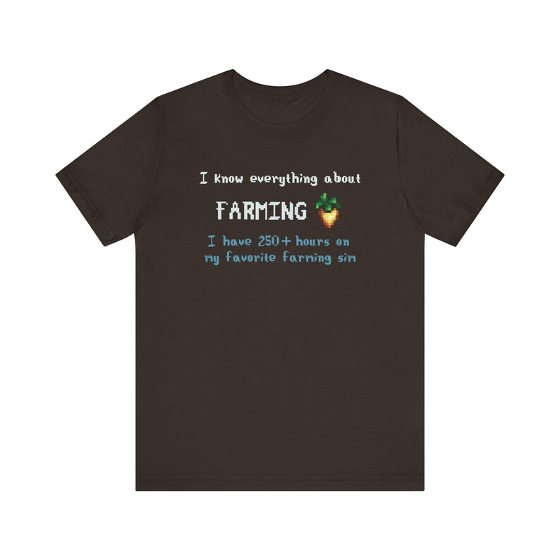 Brown t-shirt with pixelated text reading I know everything about farming followed by a parsnip icon in pixel art, and below it says, I have 250+ hours on Stardew Valley.