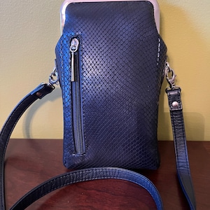 The leather navy blue purse