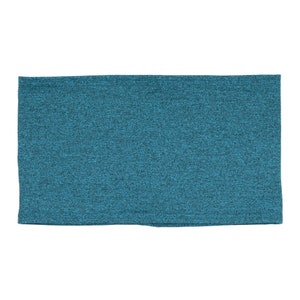 May include: A teal blue fabric headband with a textured pattern.
