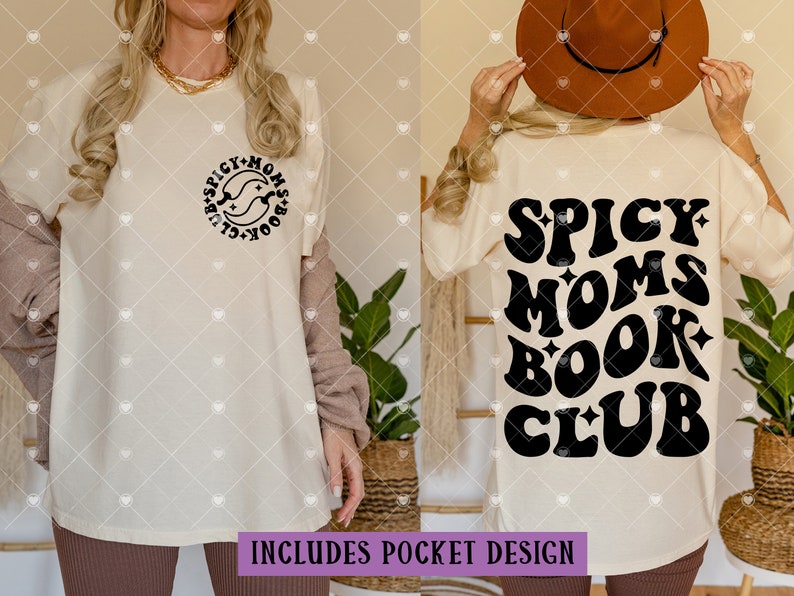 May include: A white t-shirt with a black graphic that says "Spicy Moms Book Club" in a retro font. The graphic is on the back of the shirt. The shirt is being modeled by a person wearing brown pants.