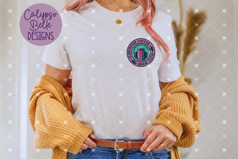 May include: White t-shirt with a purple and teal circle graphic that says "Audiobook Lovers Book Club" with a stack of books and headphones inside the circle.
