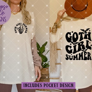 May include: A white t-shirt with a black graphic design that says "goth girl summer" on the back and a smaller design of a skeleton hand making a peace sign with the words "goth girl summer" around it on the front.