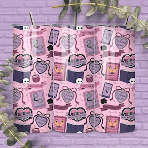 May include: A pink tumbler with a repeating pattern of hearts, books, handcuffs, and the phrases "Villain Lover," "Kidnapped," and "Morally Grey." The tumbler includes a silver straw and lid.