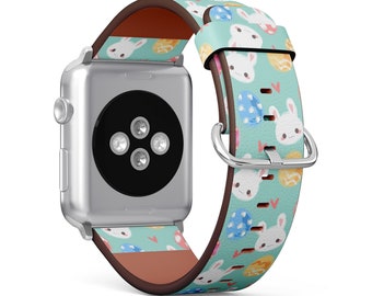 May include: A silver Apple Watch with a light blue and white patterned leather band featuring bunnies and Easter eggs.