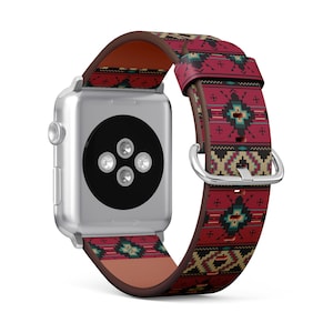 May include: Silver Apple Watch with a patterned leather band. The band features a Southwestern design in red, black, tan, and teal. The watch band is attached with a silver buckle.