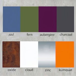 May include: A color palette chart with 10 color swatches. The top row shows the colors azul, fern, aubergine, and charcoal. The bottom row shows the colors oxide, cloud, zinc, and kumquat.