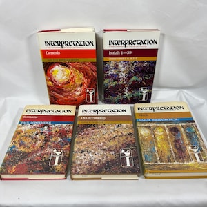 May include: Five books from the "Interpretation" series are displayed. The books have colorful covers with titles like "Genesis," "Isaiah 1-39," "Romans," "Deuteronomy," and "Mark." Each book features the series title and author's name.