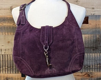 grey coach purse with purple inside