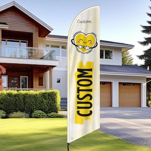 May include: A custom feather flag with a yellow heart graphic hugging itself, and the word "CUSTOM" in bold yellow letters. The flag is cream-colored and is displayed outdoors in front of a house.