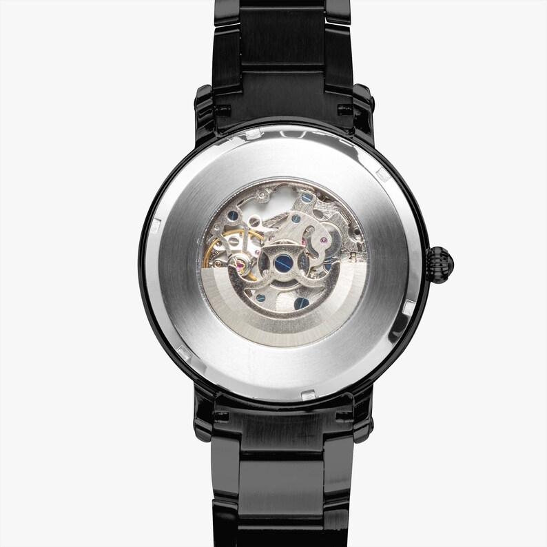 May include: Black wristwatch with a transparent back, showcasing the intricate mechanical movement. The watch has a black metal band and a round face. The watch's design emphasizes the internal gears and components, offering a glimpse into its inner workings.