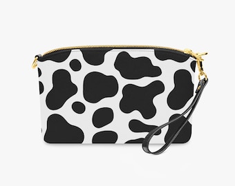 Bolso bandolera con estampado de vaca y correa de muñeca: Monedero de piel sintética con doble correa