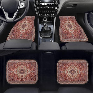 May include: Car floor mats with a traditional rug design. The mats are primarily red with intricate patterns in shades of cream, brown, and blue. The set includes mats for the front and back seats, offering a decorative and functional car accessory.