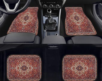 May include: Car floor mats with a traditional rug design. The mats are primarily red with intricate patterns in shades of cream, brown, and blue. The set includes mats for the front and back seats, offering a decorative and functional car accessory.