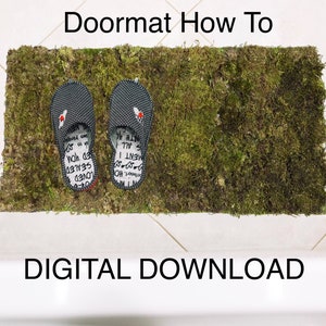 May include: A green moss doormat with the text "Doormat How To" and "DIGITAL DOWNLOAD" printed on it. Two black flip flops are placed on the doormat.
