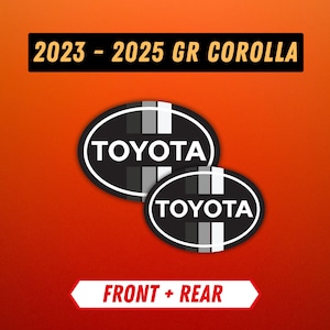 May include: Two black and white Toyota emblems with the text "TOYOTA" inside an oval shape. The text "2023 - 2025 GR COROLLA" is above the emblems, and "FRONT + REAR" is below. The background is orange and red.
