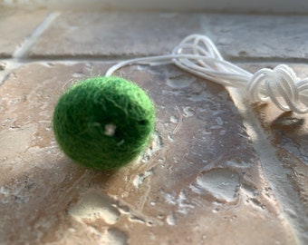 Green light pull, small light pull for bathrooms. A pretty pull cord. Scandinavian, hygge decor. Handmade, rustic style. 100% wool pull