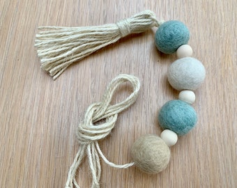 Soft bathroom light pull with jute cord in soft sea colours. Scandinavian, boho, hygge decor. Handmade, rustic style. quirky light pull.