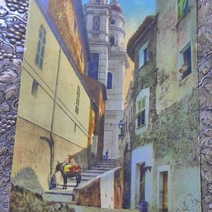 Mentão. La Rue de la Concepción. Cartão postal ilustrado em cores. Por volta de 1920.