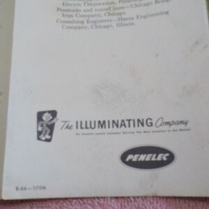 Puede incluir: Una ilustraci&oacute;n en blanco y negro de un gato de dibujos animados con un globo de di&aacute;logo que dice "The Illuminating Company". Debajo de la ilustraci&oacute;n est&aacute; el texto "An Independent Company Serving The Best Locations In The Nation" y el logotipo "PENELEC".