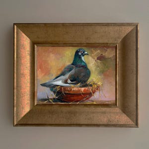 Peinture à l'huile de colombe de pigeon. Le pigeon est dans le nid. Un pigeon est assis sur des œufs dans un nid.