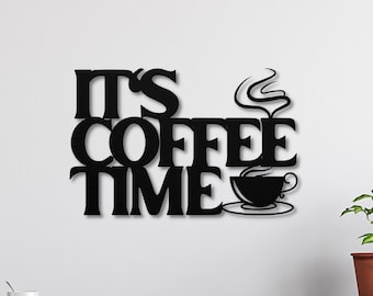 May include: Black metal wall decor with the text "It's Coffee Time" and a stylized coffee cup with steam rising from it.