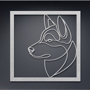 Pode incluir: Um desenho de linha da cabe&ccedil;a de um c&atilde;o em uma moldura prateada. O c&atilde;o est&aacute; olhando para a esquerda e tem um focinho longo e orelhas ca&iacute;das.