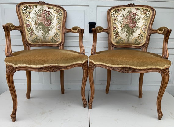 A Pair of Louis XV Style Walnut Armchairs. 