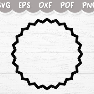 May include: A black and white image of a circular, scalloped frame. The frame is on a white wood background.
