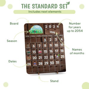 May include: A wooden calendar with a brown background and a stand. The calendar has a small picture of a house in a forest at the top. The calendar is labeled with the year 2024 and the month of May. The calendar has days of the week and dates. The calendar is labeled with the words "The Standard Set" and "Includes next elements".