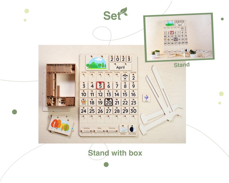 May include: A wooden calendar set with a stand and a box of numbered tiles. The calendar features a simple design with a light wood finish and a white background. The calendar is labeled "2023 April" and has a grid of numbers from 1 to 30. The stand is made of wood and has a simple design. The box of numbered tiles is made of wood and has a light wood finish.