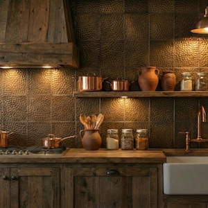 May include: A traditional kitchen featuring wooden cabinetry, shelving, and a range hood. Copper pots and spice jars are arranged. The sink is white, and the backsplash has a textured finish. Warm lighting creates a welcoming feel.