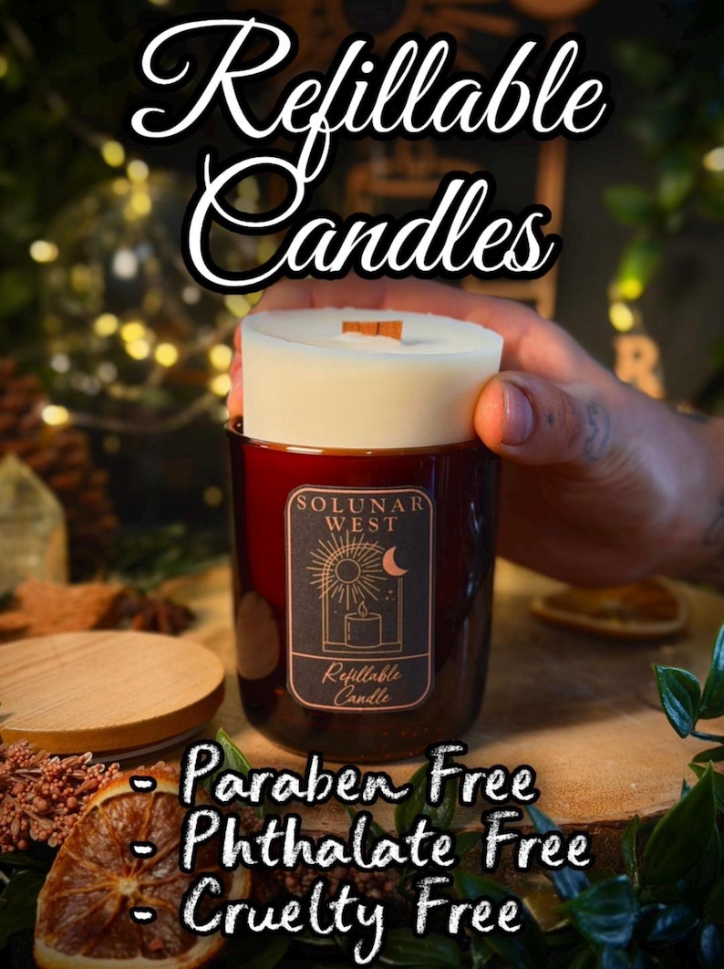 May include: A refillable candle in a dark amber glass jar with a wooden wick. The label features the text Solunar West, Refillable Candle, and a sun and moon graphic. The text Refillable Candles, Paraben Free, Phthalate Free, and Cruelty Free is present.