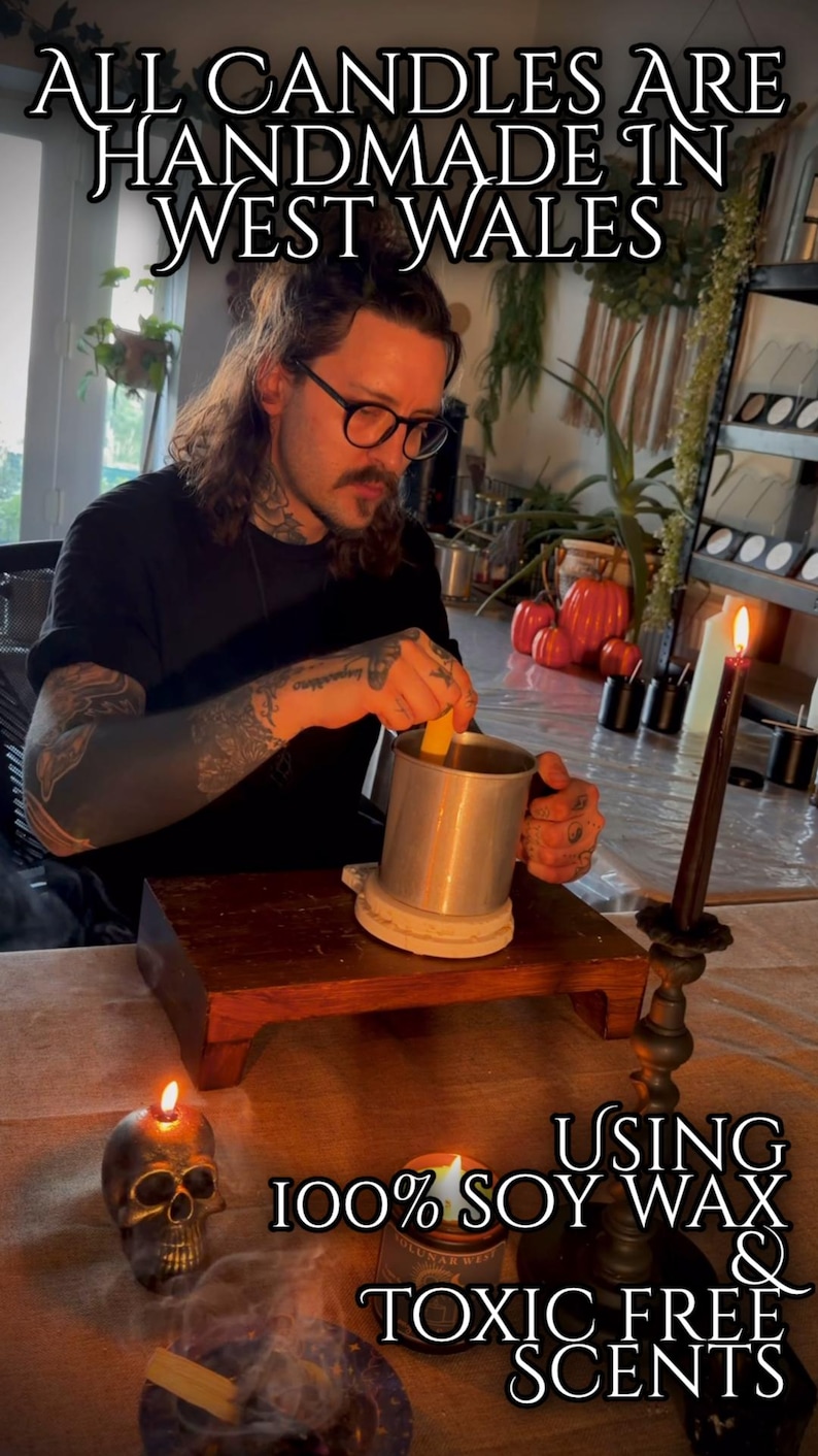 May include: A metal pouring pitcher for candle making, a skull-shaped candle, and a lit taper candle. Text reads: ALL CANDLES ARE HANDMADE IN WEST WALES USING 100% SOY WAX & TOXIC FREE SCENTS. The scene includes a wooden stand and a burning incense stick.