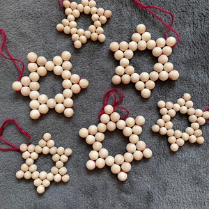 Star made of wooden beads, 6-pointed | Christmas decorations | Beaded stars, stars, Christmas tree, Christmas, natural Christmas decoration