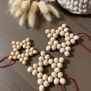 Star made of wooden beads, 5-pointed | Christmas decorations | Beaded stars, stars, Christmas tree, Christmas, natural Christmas decorations