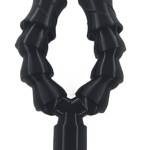 May include: A set of three ceramic mugs with a speckled, matte finish. The mugs are in shades of cream, light gray, and dark gray. Each mug has a simple, minimalist design, perfect for coffee or tea.