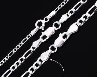 May include: Three silver chains of different widths, with a close-up of the clasp on the thickest chain showing the 925 Italy stamp.