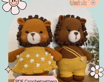 May include: Two crocheted lion dolls. One doll wears a yellow dress with white polka dots, the other wears yellow overalls. Both have brown manes and white faces. The image includes the text "Boutique Uniek" and "PDF Crochetpattern Dutch & English."