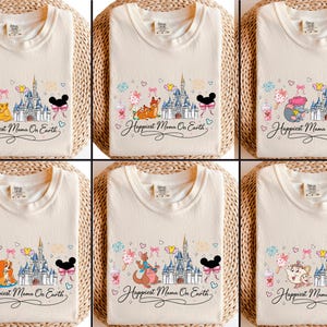 The image is a collage of six white t-shirts, each featuring a Disney-themed design with various Disney characters and landmarks, such as a castle, Mickey Mouse, and other iconic figures.