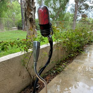 May include: A vintage microphone lamp with a red LED light, mounted on a flexible gooseneck arm, and a wooden base.