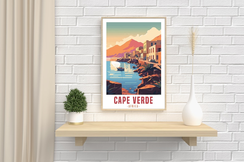 May include: A vintage travel poster with a colorful illustration of a seaside town in Cape Verde, Africa. The poster features a blue ocean, a small boat, and buildings with red roofs.