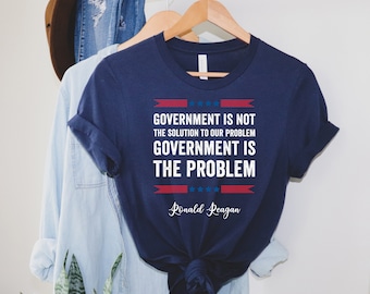 Ronald Reagan cita camiseta, el gobierno es el problema camisa, huelo commies, camisa conservadora, camisa republicana, camiseta patriótica