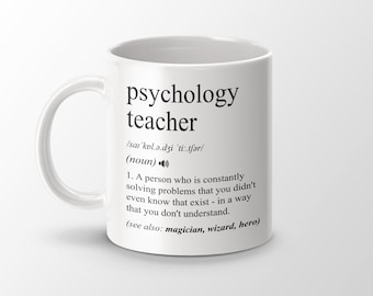 May include: White ceramic mug with a black design that defines "psychology teacher" as a person who is constantly solving problems that you didn't even know that exist in a way that you don't understand. The definition also includes the words "magician, wizard, hero".