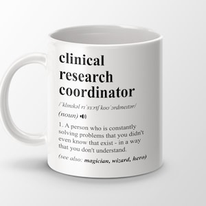 May include: White ceramic mug with a black design that reads "clinical research coordinator" and a definition of the term. The definition includes the phonetic spelling of the term and a humorous description of the job.