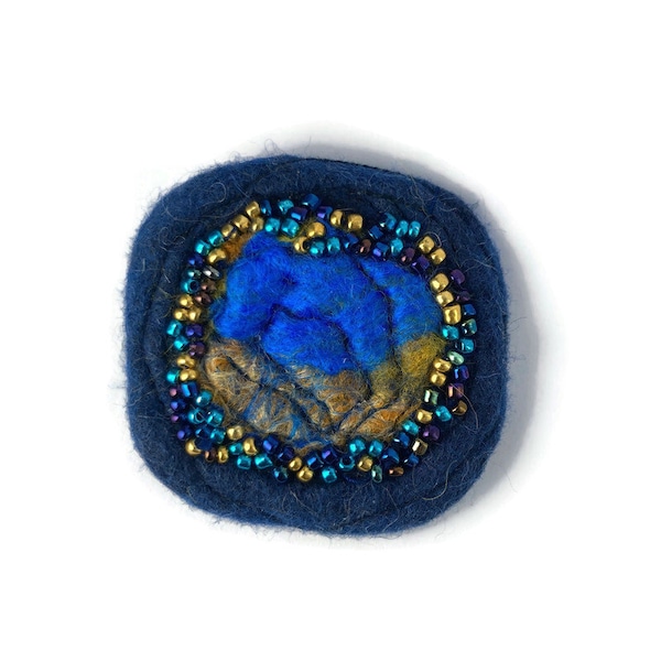 Nuno Felted brooch made with the finest merino wool, silk viscose and embellished with hand stitched glass seed beads