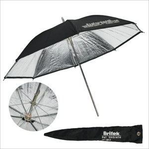 May include: A silver and black professional umbrella reflector with a black carrying case. The case has the text "Britek Ref. Umbrella 1241602" printed on it.