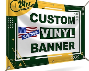May include: A custom vinyl banner with the text "CUSTOM VINYL BANNER" in large, dark green letters. The banner includes the American flag and the words "MADE IN USA". The banner has a yellow and green design.