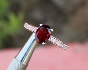 Oval Garnet Ring: Rose Gold Plated Sterling Silver, CZ Accents
