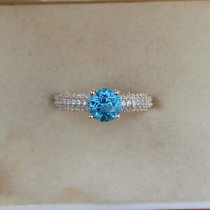 Swiss Blue Topaz Ring: Sterling Silver Halo, December Birthstone